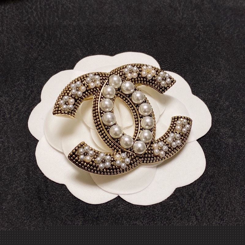 Ch*el brooches